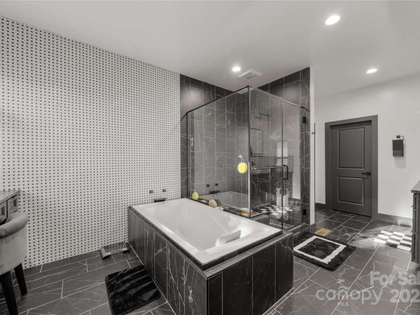 41 Ben Lippen School Road, Asheville, NC 28806.  MLS# CAR4316852, YatesRealty ID 28296. Spa inspired primary bath with large double linen closet and private water closet.