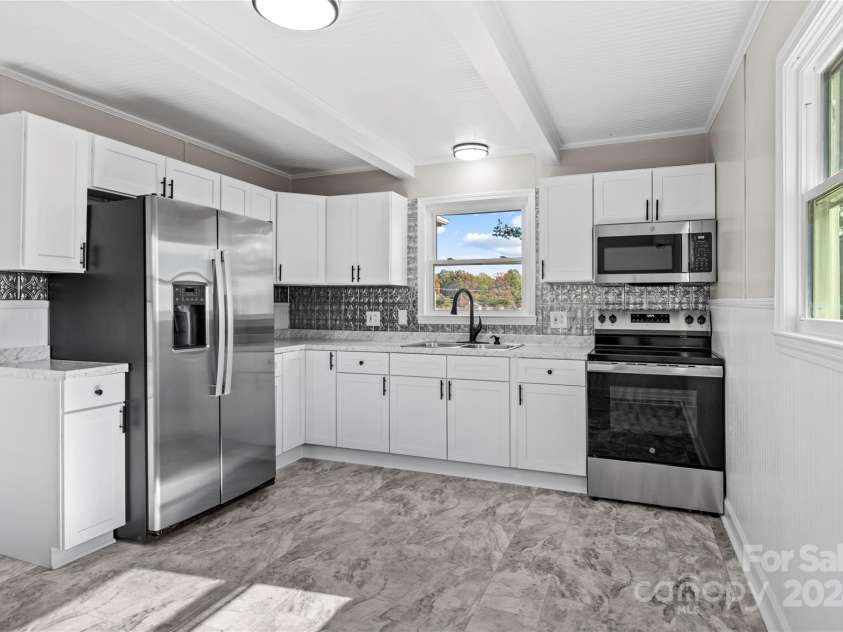 411 Taylor Allen Drive, Yadkinville, NC 27055.  MLS# CAR4202230, YatesRealty ID 283. 