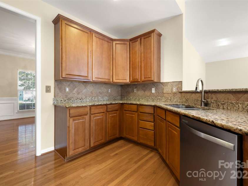 4048 Buckingham Drive, Fort Mill, SC 29707.  MLS# CAR4279953, YatesRealty ID 28305. Kitchen w/ Access to Dining Room