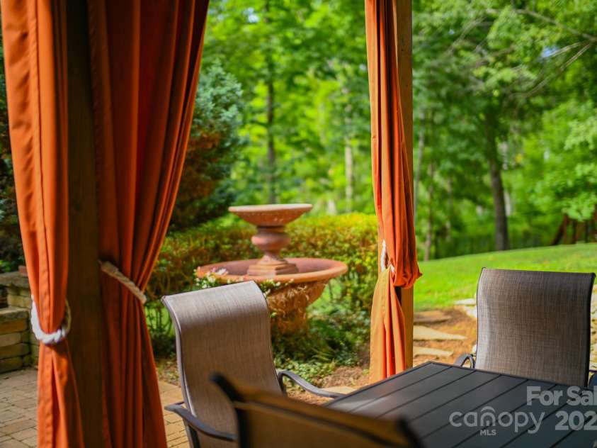 150 William Gilbert Loop, Rutherfordton, NC 28139.  MLS# CAR4282492, YatesRealty ID 28307. Back Covered Patio off of Basement