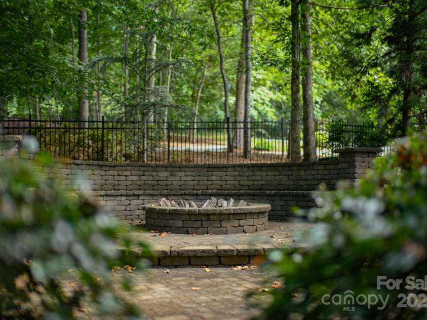 150 William Gilbert Loop, Rutherfordton, NC 28139.  MLS# CAR4282492, YatesRealty ID 28307. Outdoor Fire Pit