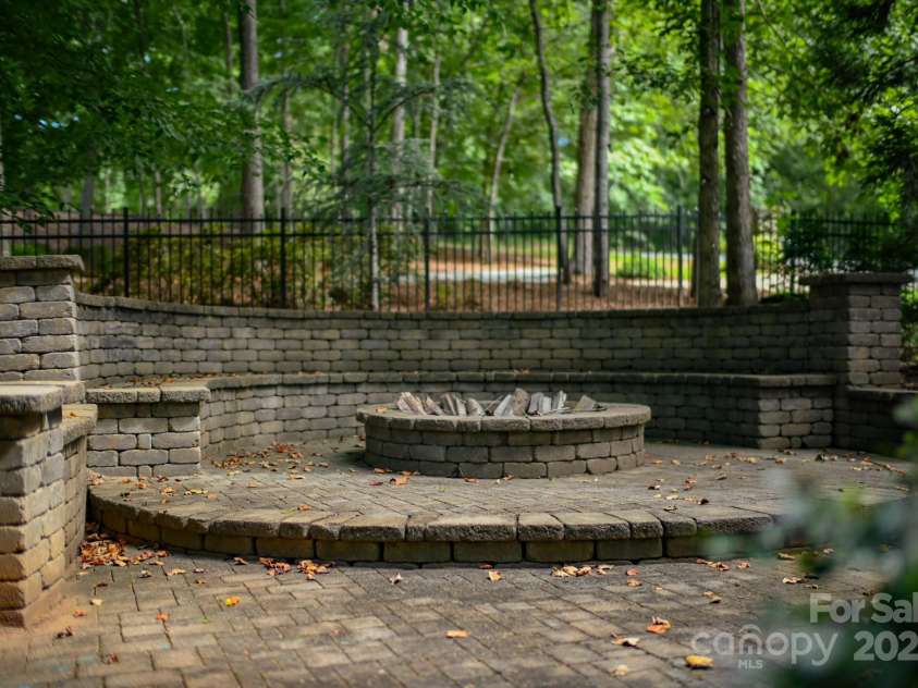 150 William Gilbert Loop, Rutherfordton, NC 28139.  MLS# CAR4282492, YatesRealty ID 28307. Outdoor Fire Pit