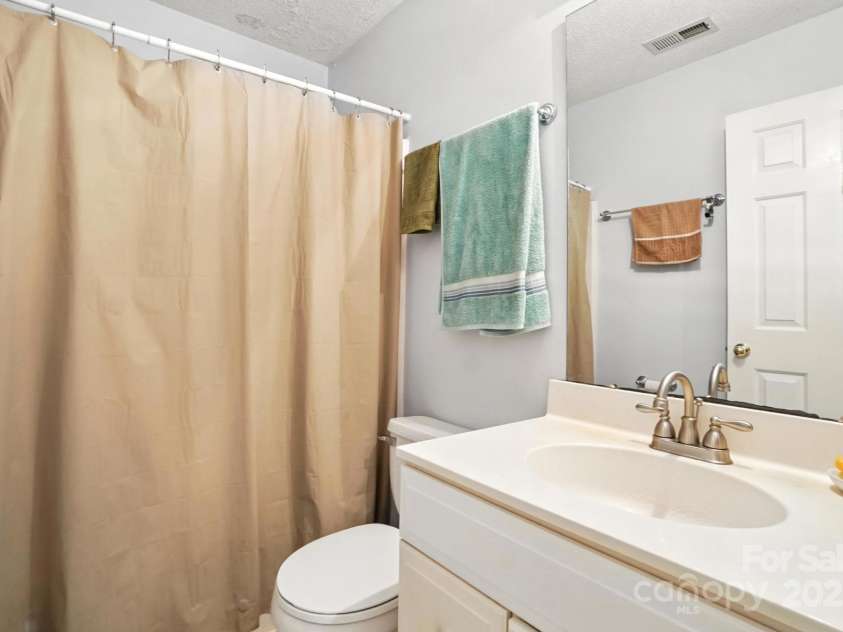 8213 Martindale Lane, Charlotte, NC 28216.  MLS# CAR4285690, YatesRealty ID 28308. Full bathroom
