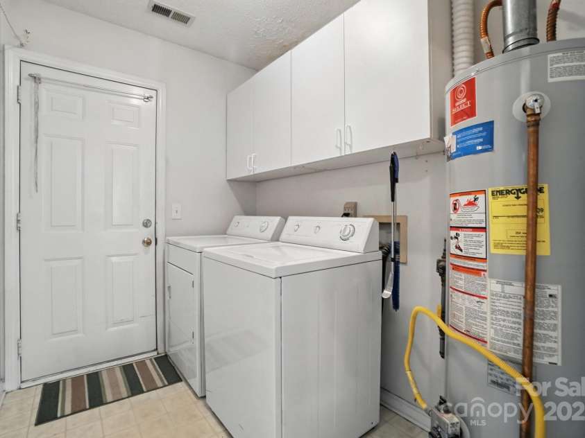 8213 Martindale Lane, Charlotte, NC 28216.  MLS# CAR4285690, YatesRealty ID 28308. Laundry room