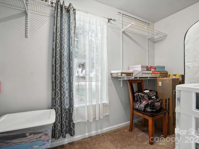 8213 Martindale Lane, Charlotte, NC 28216.  MLS# CAR4285690, YatesRealty ID 28308. Primary bedroom's closet