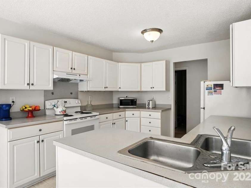 8213 Martindale Lane, Charlotte, NC 28216.  MLS# CAR4317563, YatesRealty ID 28308. 