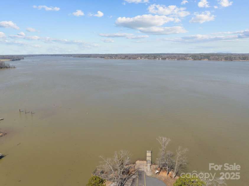 140 Swimmers Lane, Salisbury, NC 28146.  MLS# CAR4233458, YatesRealty ID 28311. Water from the Community Boat ramp