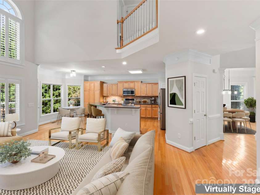 551 Hemmings Place, Concord, NC 28027.  MLS# CAR4244945, YatesRealty ID 28312. Great Room and Kitchen