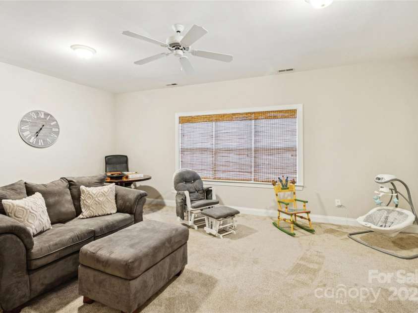 551 Hemmings Place, Concord, NC 28027.  MLS# CAR4244945, YatesRealty ID 28312. Large Bonus Room - Perfect for Entertainment