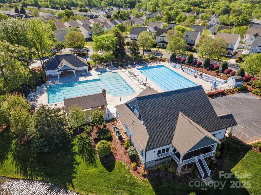 551 Hemmings Place, Concord, NC 28027.  MLS# CAR4244945, YatesRealty ID 28312. Laurel Park Community Pools and Clubhouse