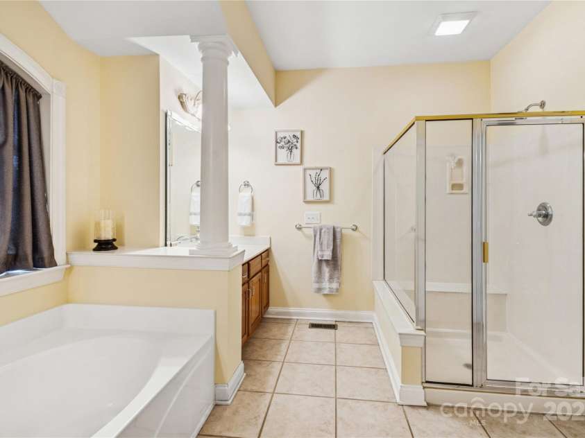 551 Hemmings Place, Concord, NC 28027.  MLS# CAR4244945, YatesRealty ID 28312. Primary Bathroom