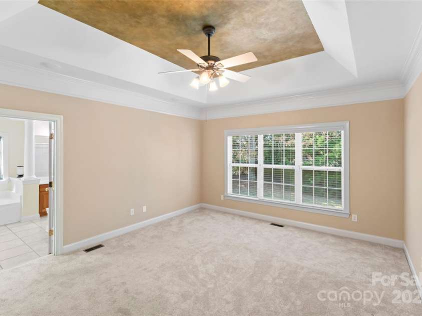 551 Hemmings Place, Concord, NC 28027.  MLS# CAR4244945, YatesRealty ID 28312. Primary Bedroom