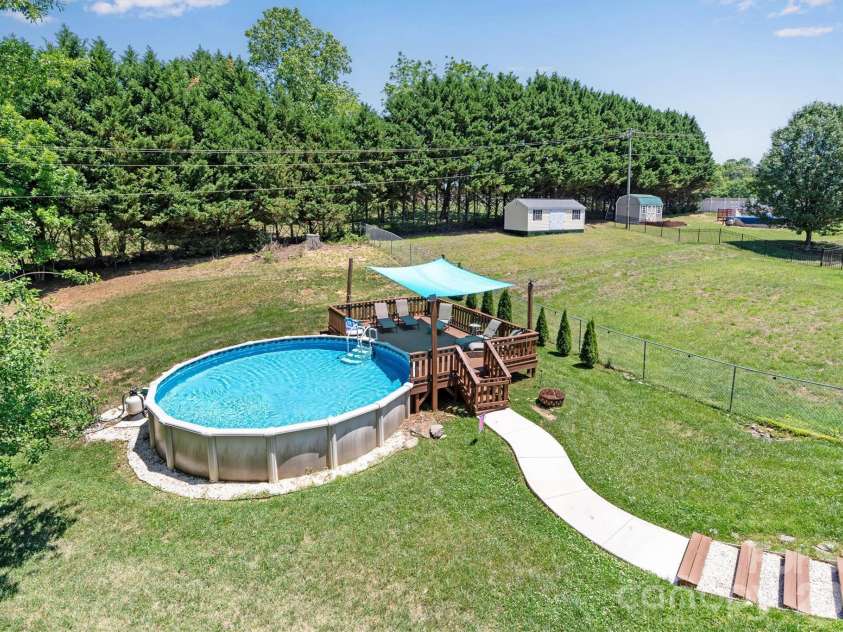 3353 48th Avenue Lane, Hickory, NC 28601.  MLS# CAR4381389, YatesRealty ID 28313. Back Yard/Pool View