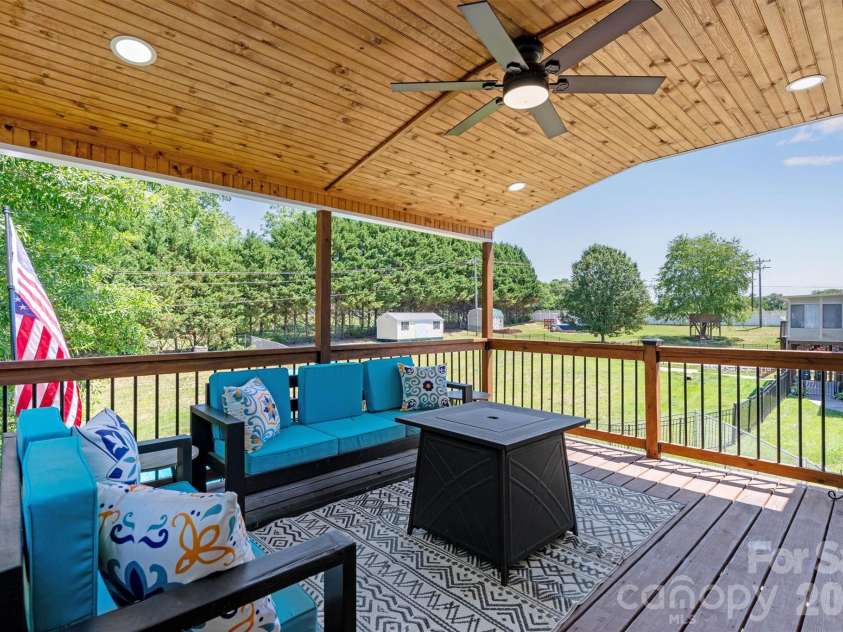 3353 48th Avenue Lane, Hickory, NC 28601.  MLS# CAR4381389, YatesRealty ID 28313. Covered Back Deck/Back Yard View