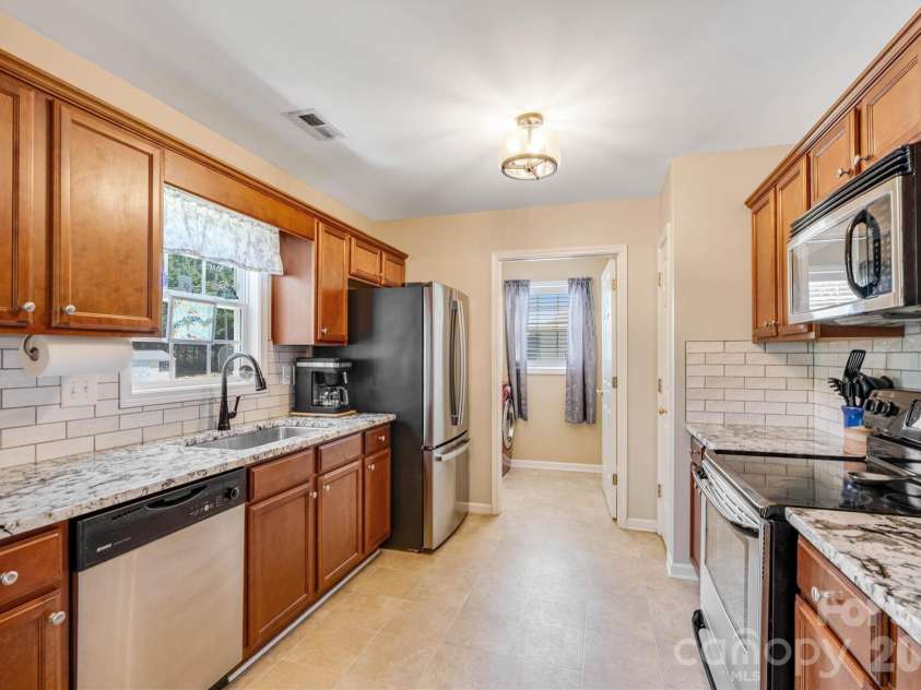 3353 48th Avenue Lane, Hickory, NC 28601.  MLS# CAR4381389, YatesRealty ID 28313. Focused Kitchen/Laundry Room Entry View