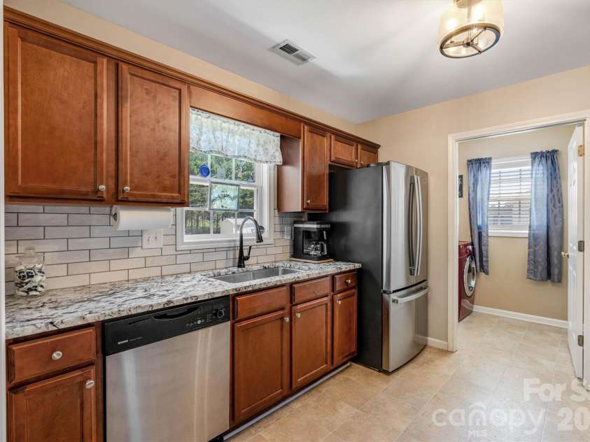 3353 48th Avenue Lane, Hickory, NC 28601.  MLS# CAR4381389, YatesRealty ID 28313. Focused Kitchen/Laundry Room Entry View