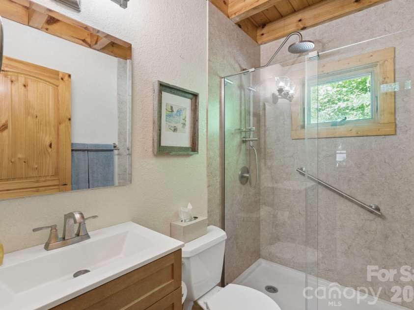 89 Apgar Road, Candler, NC 28715.  MLS# CAR4397603, YatesRealty ID 28314. Fully renovated bathroom