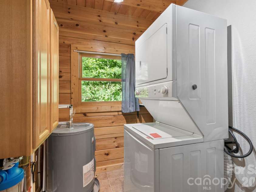 89 Apgar Road, Candler, NC 28715.  MLS# CAR4397603, YatesRealty ID 28314. Utility room and laundry