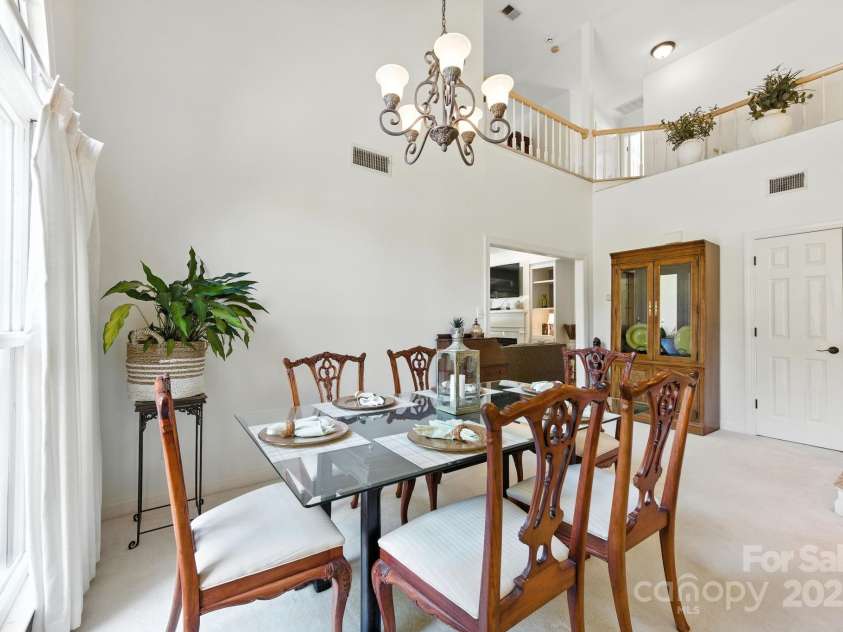 7014 Walton Heath Lane, Charlotte, NC 28277.  MLS# CAR4274206, YatesRealty ID 28318. This is the Dining area with another view of the soaring ceiling!