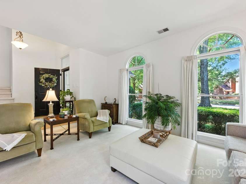 7014 Walton Heath Lane, Charlotte, NC 28277.  MLS# CAR4274206, YatesRealty ID 28318. Your Family Room is complimented by floor-to-ceiling windows!