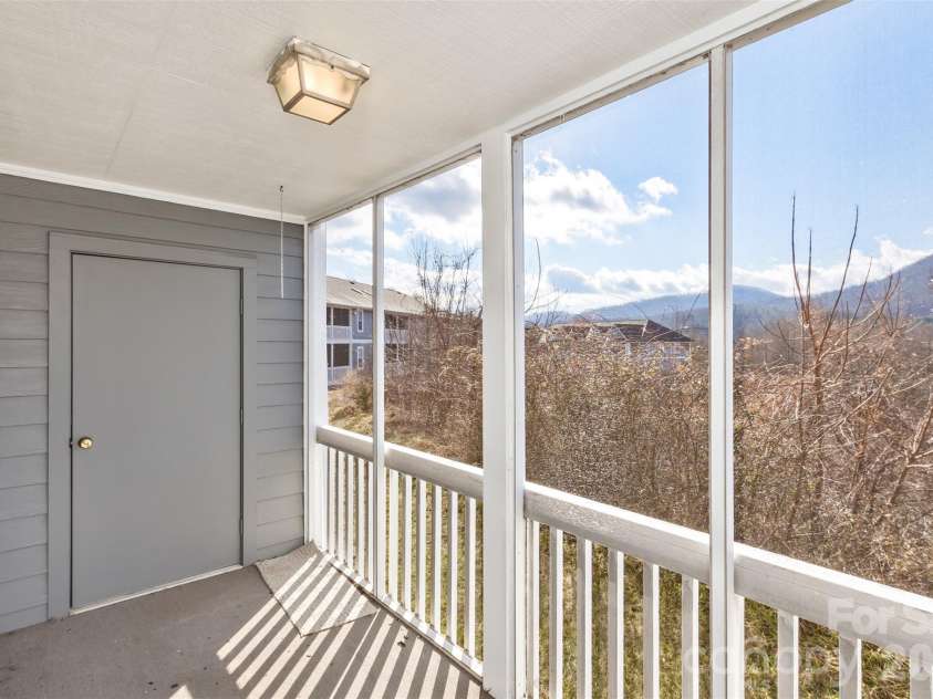 3305 Idle Hour Drive, Asheville, NC 28806.  MLS# CAR4336011, YatesRealty ID 2832. Your screened porch