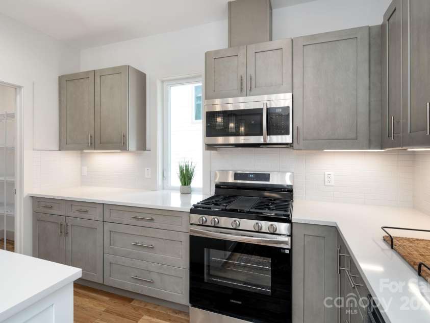 5 Orrinel Way, Asheville, NC 28806.  MLS# CAR4294195, YatesRealty ID 2832. Soft-Close Cabinets and Gorgeous Tile Backsplash