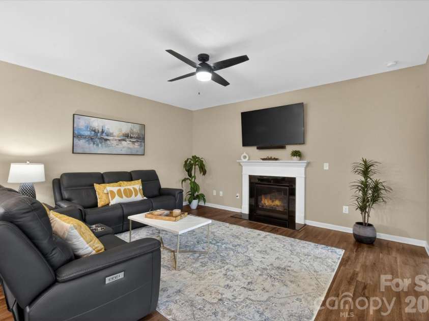 1688 Tranquility Boulevard, Lancaster, SC 29720.  MLS# CAR4387439, YatesRealty ID 28321. Family room with fireplace
