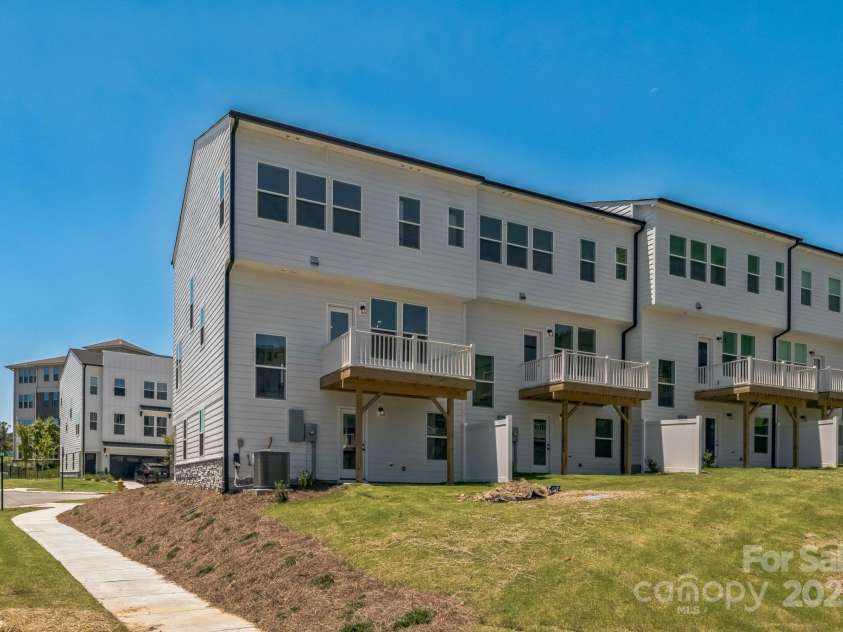 9212 Delancey Lane, Concord, NC 28027.  MLS# CAR4276027, YatesRealty ID 28322. Back Exterior