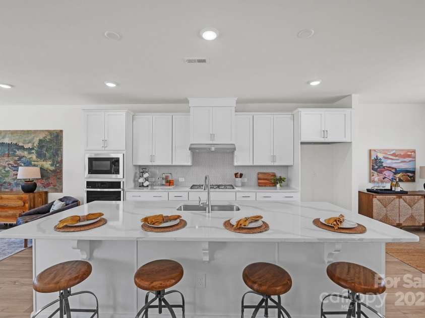 9212 Delancey Lane, Concord, NC 28027.  MLS# CAR4276027, YatesRealty ID 28322. Kitchen island view 2