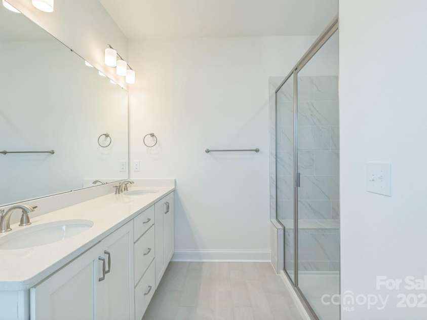 9212 Delancey Lane, Concord, NC 28027.  MLS# CAR4276027, YatesRealty ID 28322. Master bath