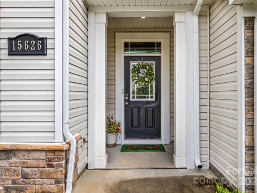 15626 Little Bluestem Street, Charlotte, NC 28278.  MLS# CAR4278751, YatesRealty ID 28323. Covered front door with porch