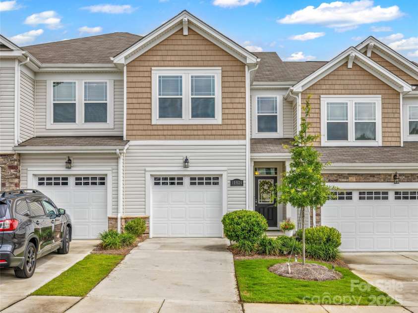 15626 Little Bluestem Street, Charlotte, NC 28278.  MLS# CAR4278751, YatesRealty ID 28323. Front facade with one car garage