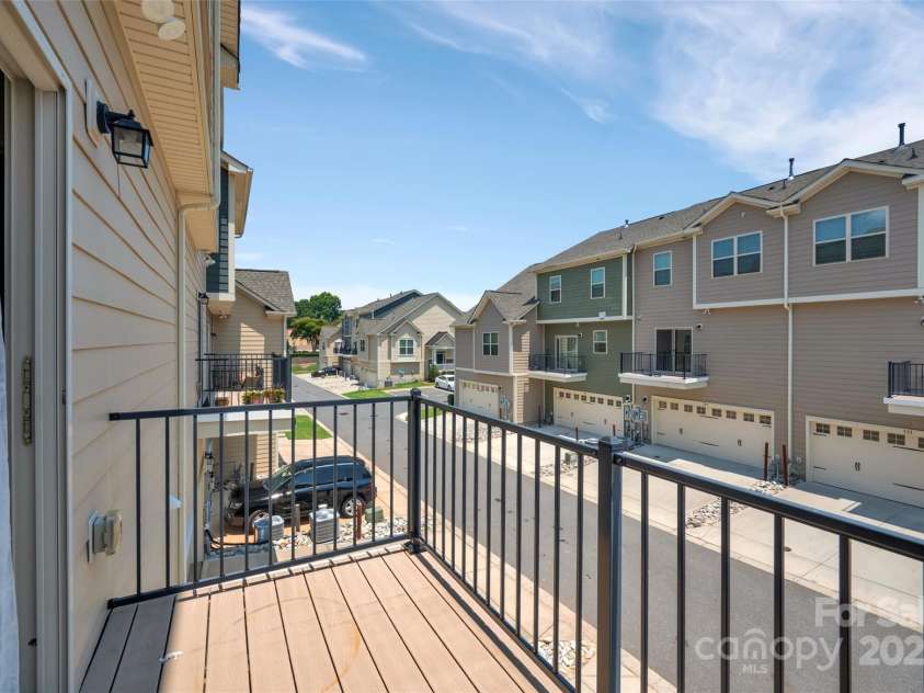 6263 Cloverdale Drive, Tega Cay, SC 29708.  MLS# CAR4279308, YatesRealty ID 28324. Deck above garage area