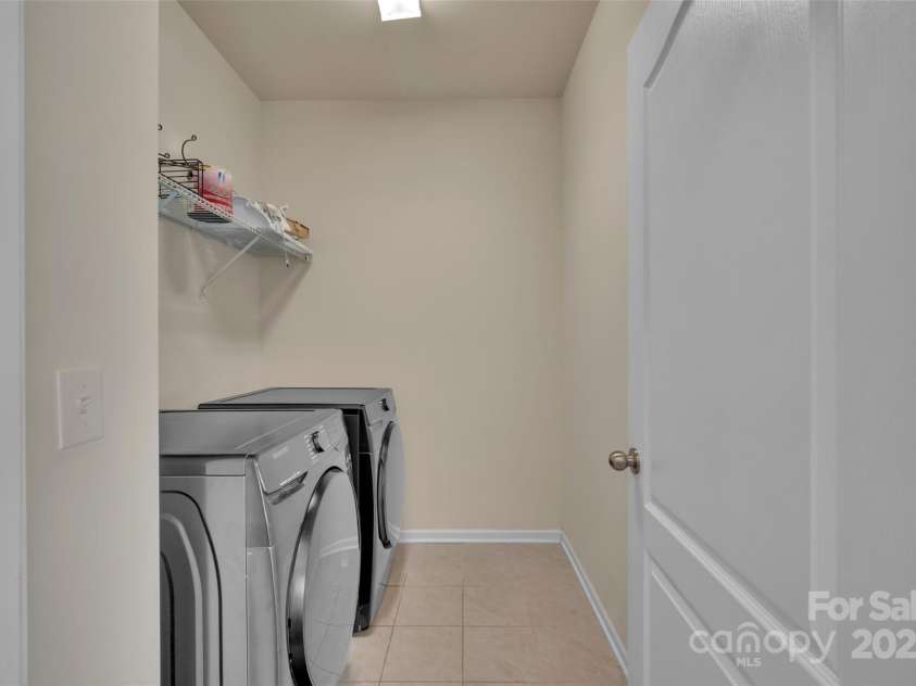 6263 Cloverdale Drive, Tega Cay, SC 29708.  MLS# CAR4279308, YatesRealty ID 28324. Laundry Room