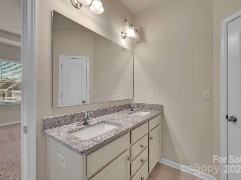 6263 Cloverdale Drive, Tega Cay, SC 29708.  MLS# CAR4279308, YatesRealty ID 28324. Primary Bath