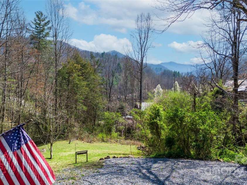 215 Honeysuckle Lane, Sylva, NC 28779.  MLS# CAR4243032, YatesRealty ID 2833. 