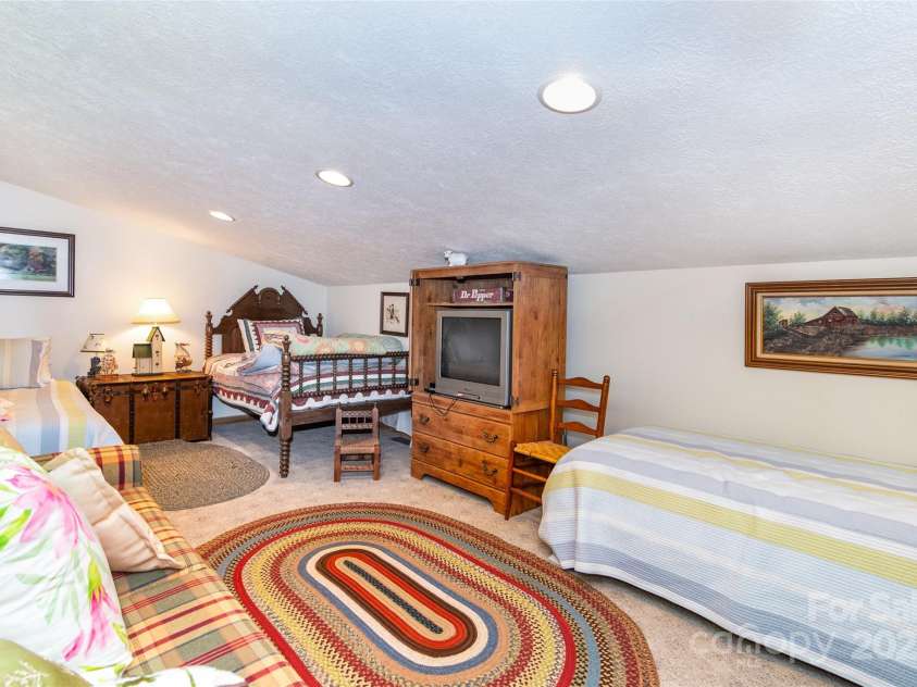 215 Honeysuckle Lane, Sylva, NC 28779.  MLS# CAR4243032, YatesRealty ID 2833. 