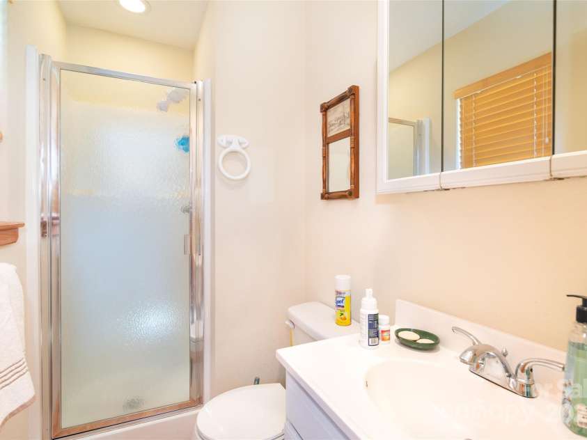 215 Honeysuckle Lane, Sylva, NC 28779.  MLS# CAR4243032, YatesRealty ID 2833. 