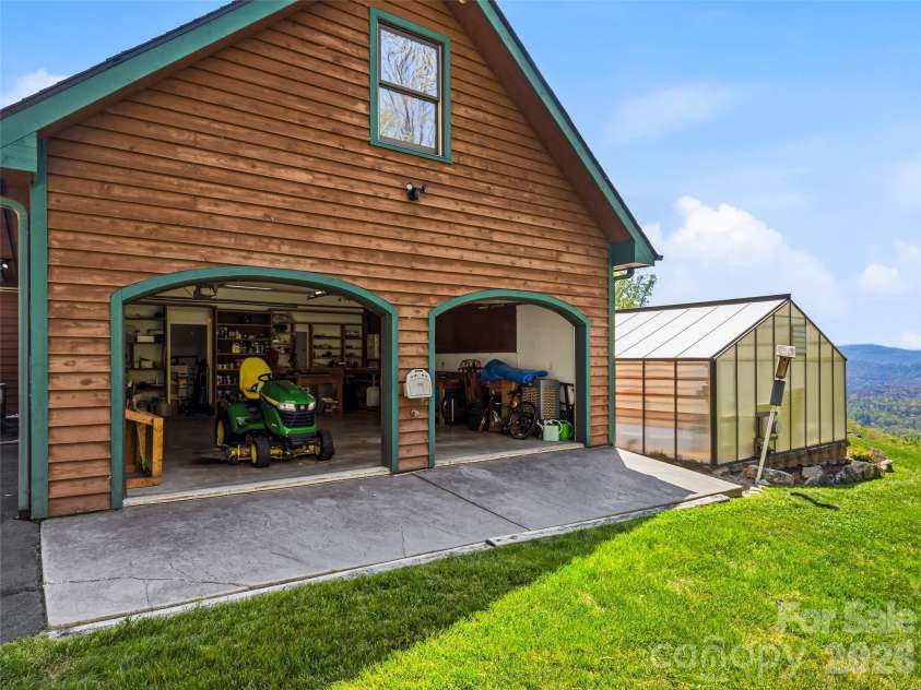 91 Great Oak Lane, Fairview, NC 28730.  MLS# CAR4376722, YatesRealty ID 28334. 2nd garage has workshop area and yard access
