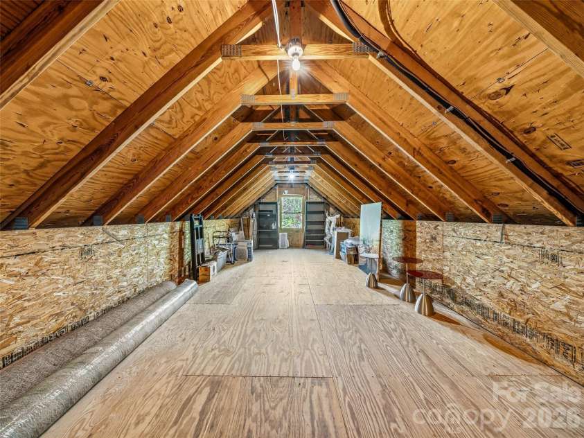 91 Great Oak Lane, Fairview, NC 28730.  MLS# CAR4376722, YatesRealty ID 28334. 735 sq' storage loft above garages