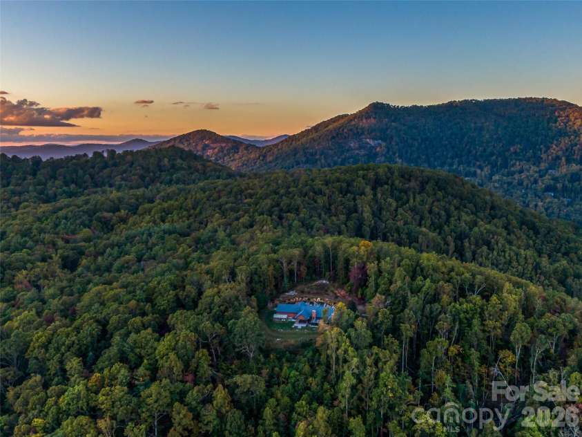 91 Great Oak Lane, Fairview, NC 28730.  MLS# CAR4376722, YatesRealty ID 28334. Drone view looking N.E. towards Southcliffe