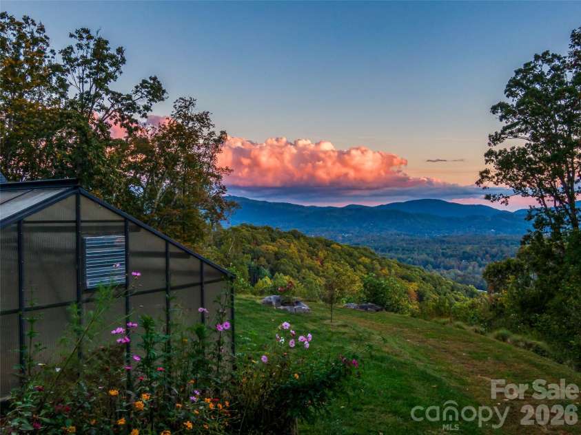 91 Great Oak Lane, Fairview, NC 28730.  MLS# CAR4376722, YatesRealty ID 28334. Gardening with inspirational views
