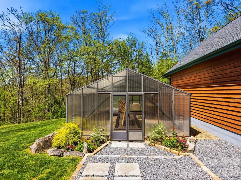 91 Great Oak Lane, Fairview, NC 28730.  MLS# CAR4376722, YatesRealty ID 28334. Grow your own veggies