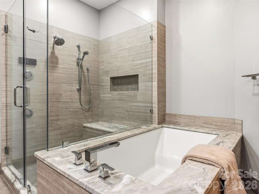 91 Great Oak Lane, Fairview, NC 28730.  MLS# CAR4376722, YatesRealty ID 28334. Primary Bathroom w programmable shower heads 
