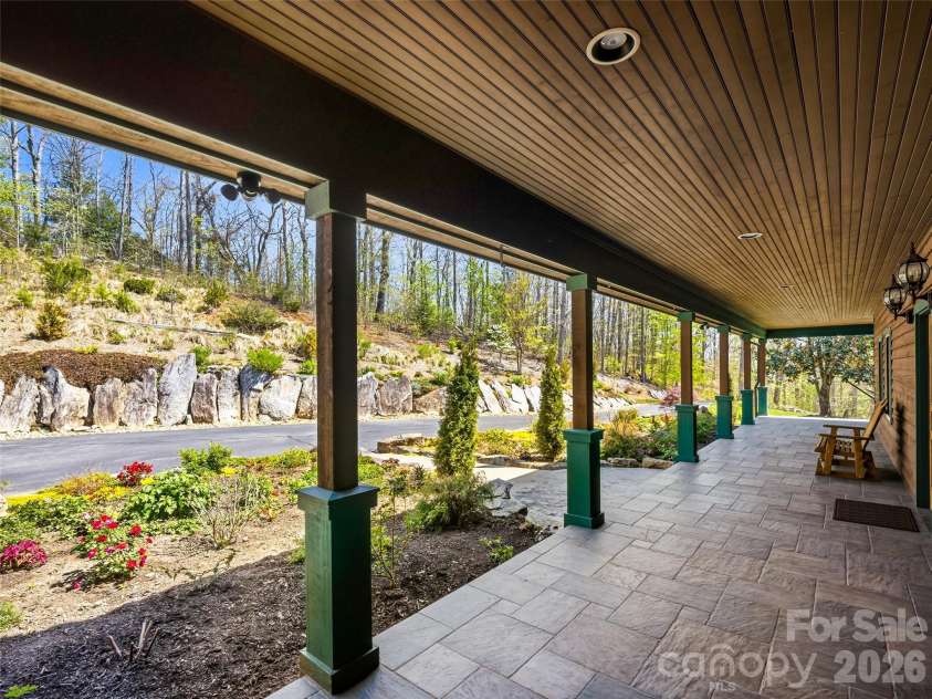 91 Great Oak Lane, Fairview, NC 28730.  MLS# CAR4376722, YatesRealty ID 28334. Spacious front porch