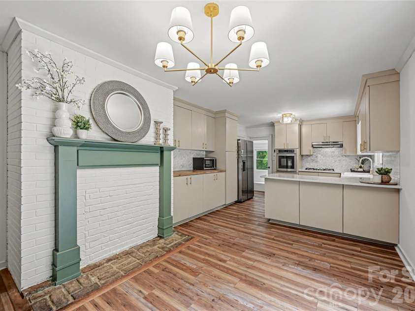 716 Grandview Drive, Concord, NC 28025.  MLS# CAR4390643, YatesRealty ID 28336. Open dining and kitchen layout creates an ideal space for entertaining, gathering, and everyday living.