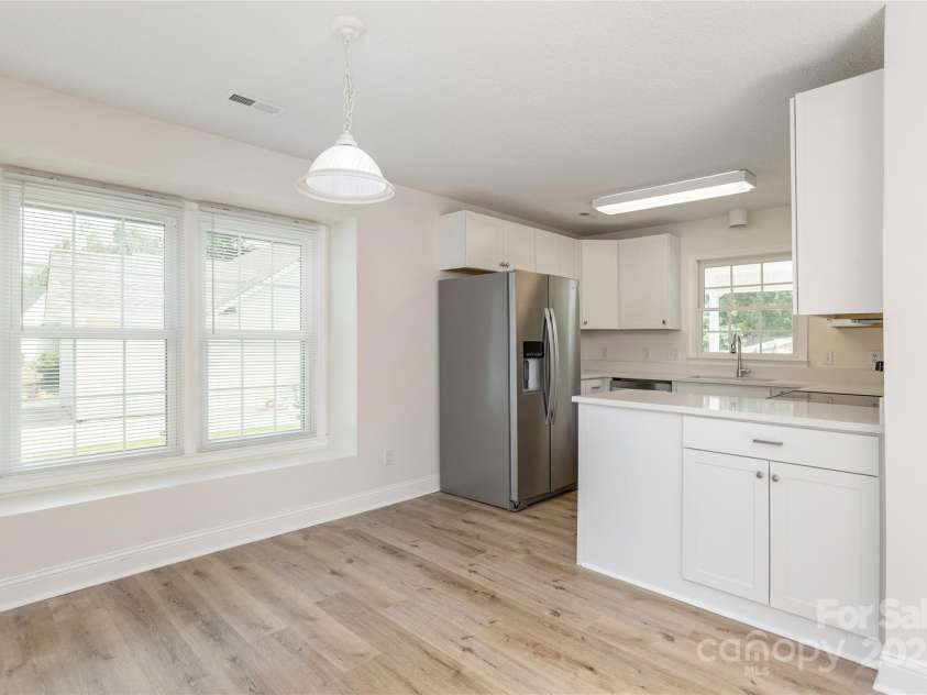 802 Woodlark Court, Fletcher, NC 28732.  MLS# CAR4274029, YatesRealty ID 28336. Dining and Kitchen