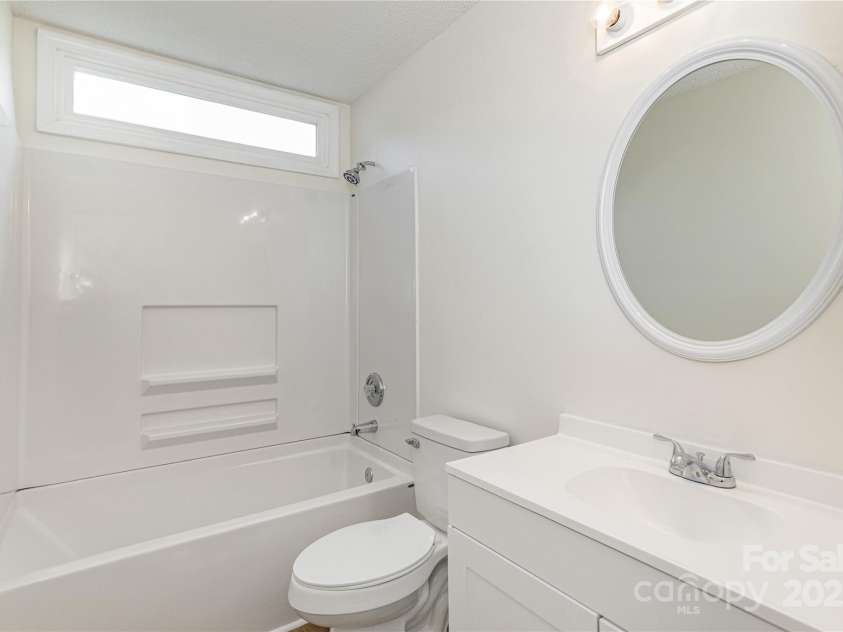 802 Woodlark Court, Fletcher, NC 28732.  MLS# CAR4274029, YatesRealty ID 28336. Main Hall Bath--Everything NEW!!
