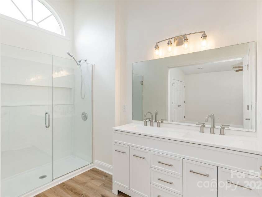 802 Woodlark Court, Fletcher, NC 28732.  MLS# CAR4274029, YatesRealty ID 28336. Primary Bath with New Vanity, Shower & Toilet
