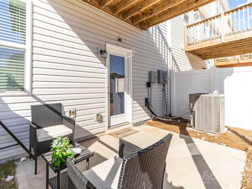 1132 Keydet Drive, Charlotte, NC 28216.  MLS# CAR4321794, YatesRealty ID 2834. Back patio